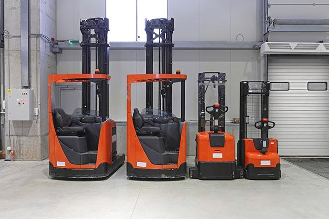 forklifts parked in a storage area